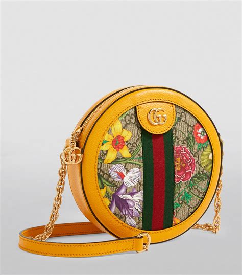 small gucci tassle round crossbody|Gucci clutch bag.